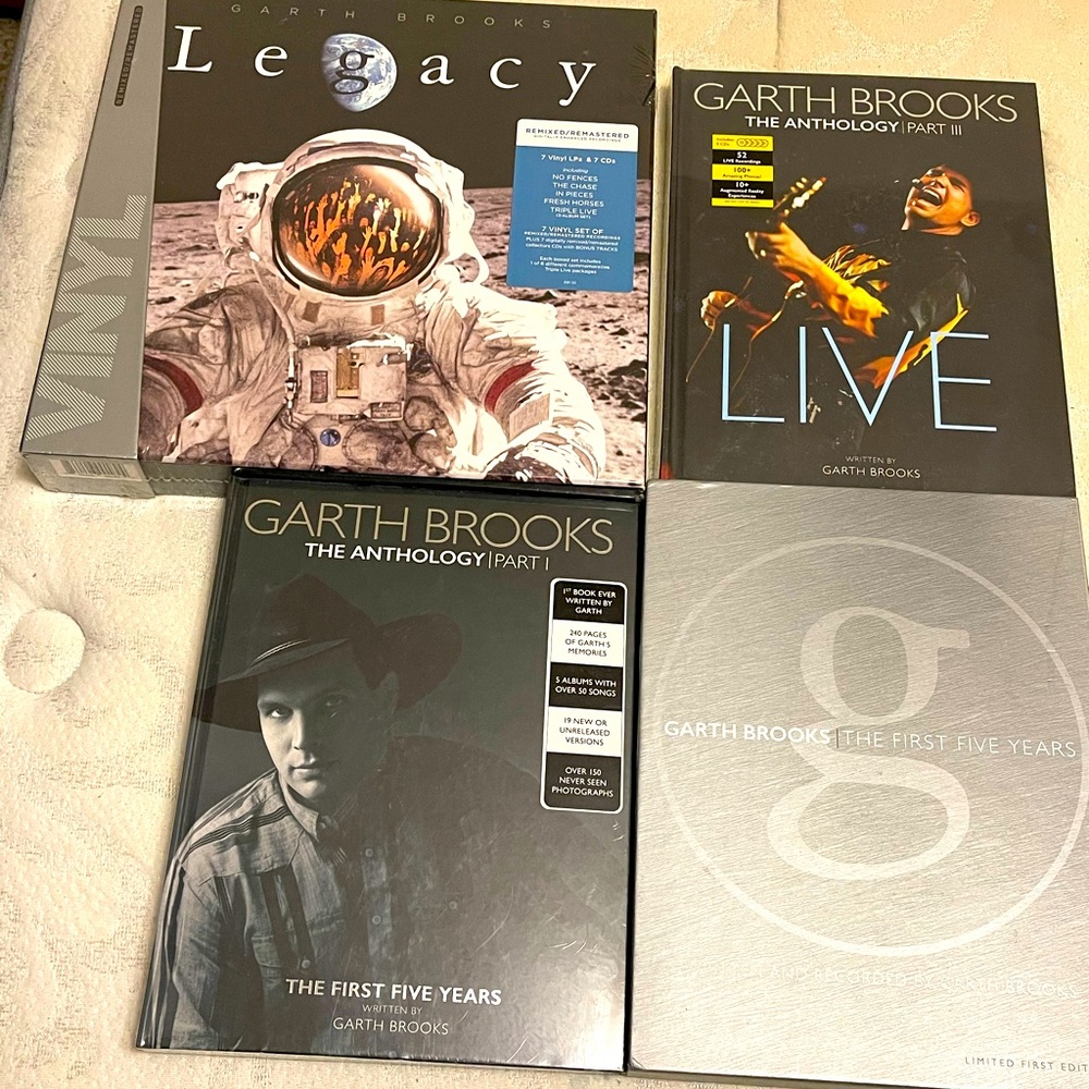Garth brooks book  originally 45$ a piece willing to settle for 90$ for all 4.